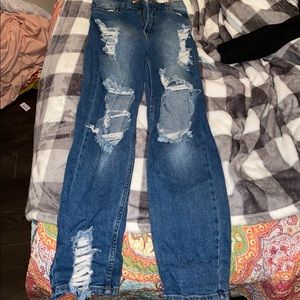 Boutique medium wash jeans. Size 7. Never worn. New With Tags